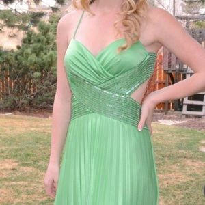 Green open back dress